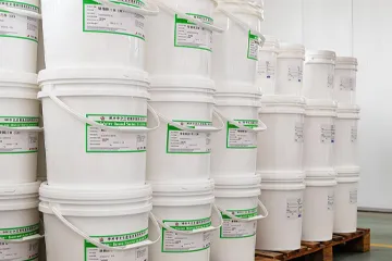 Neat ink drums in warehouse